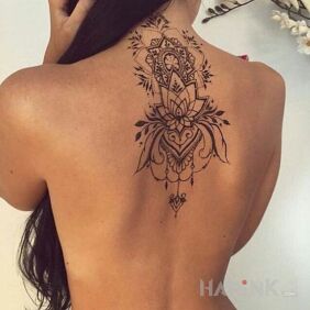 Tattoo Lilia on the nape motif: flowers