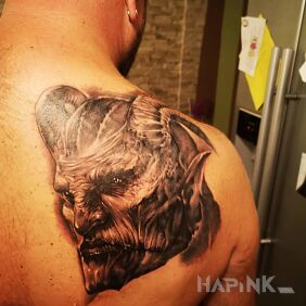 Tattoo Satan ? on the shoulder blades motif: demons