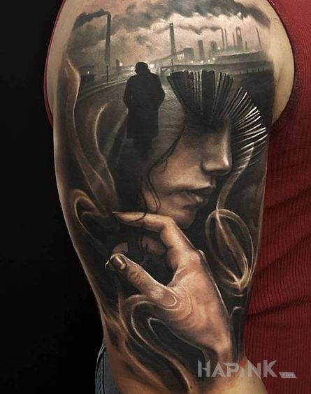 Tattoo Twarz wśród fabryk in 3D motif on the upper arm