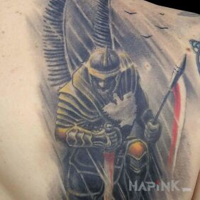Tattoo Hussar on the shoulder blades motif: colorful