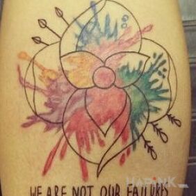 Tattoo Failures on the calf motif: colorful