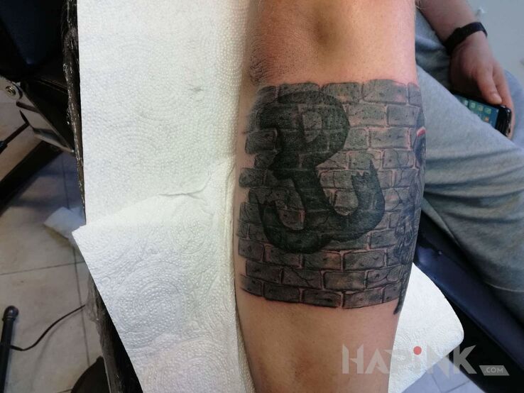 Tattoo Mały powstaniec in patriotic motif on the forearm