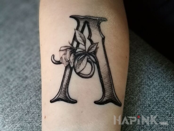 Tattoo LITERKA in lettering motif on the forearm