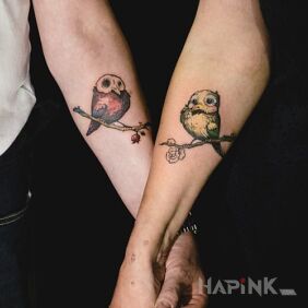 Tattoo Two lovebirds on the forearm motif: colorful