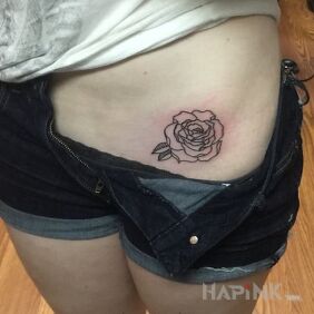 Tattoo Rose outline on the stomach motif: flowers