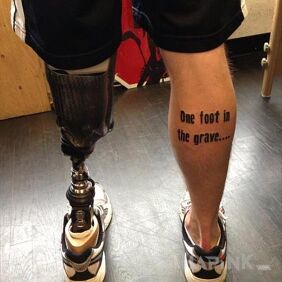 Tattoo One leg on the calf motif: lettering