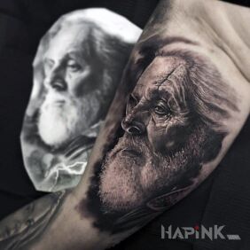 Tattoo Film odyn on the upper arm motif: characters style: realistic