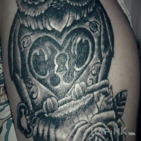 Tattoo Owl on the upper arm motif: animals