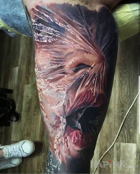 Tattoo Realizm 500% in colorful motif and realistic style on the upper arm