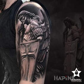 Tattoo Saint Michael the Archangel on the upper arm motif: angels style: realistic