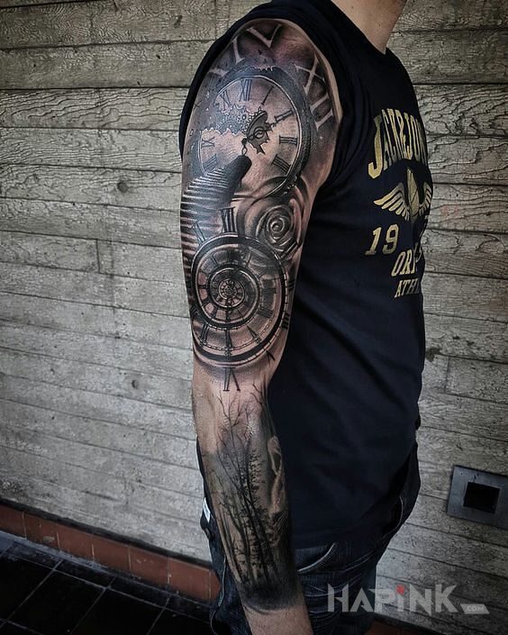 Tattoo Załamanie czasu in sleeves motif on the upper arm