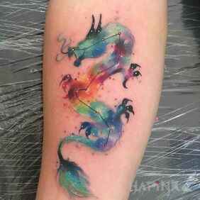 Tattoo Constellation of the dragon on the forearm motif: dragons