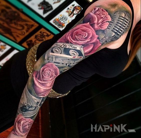 Tattoo Kwiaty i muzyka in 3D motif and realistic style on the forearm