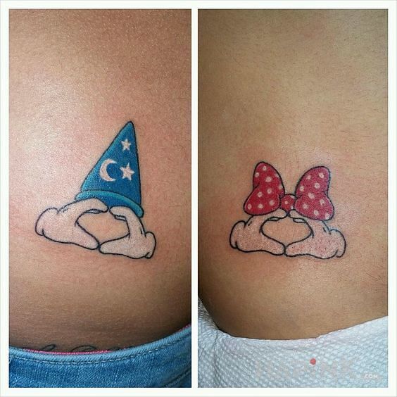 Tattoo Mickey mouse in Love motif on the stomach