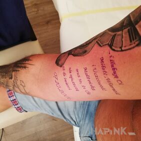 Tattoo Anniversary on the upper arm motif: other