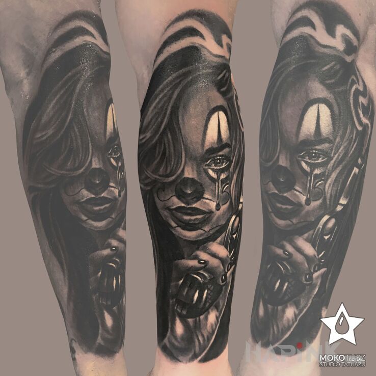 Tattoo Chicano Style in faces motif and realistic style on the forearm