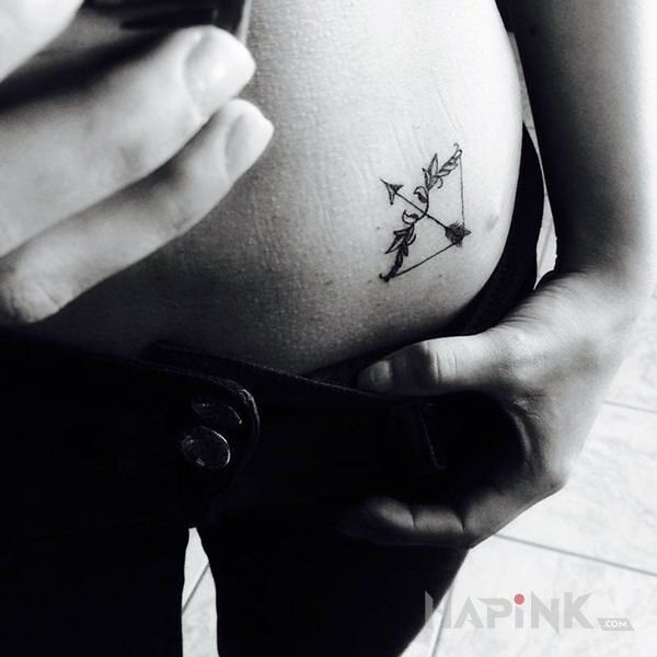 Tattoo Łuk in other motif on the stomach