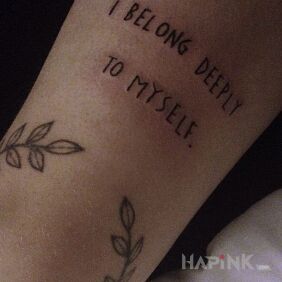 Tattoo Who do you belong to? on the forearm motif: lettering