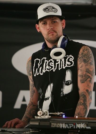 Tattoo DJ Joel Madden in famous people motif on the forearm