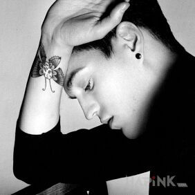 Tattoo Josh Beech - butterfly with skull on the wrist motif: Josh Beech