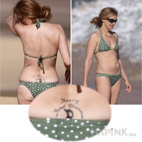 Tattoo Julia Roberts tattoo in the form of an inscription on the back motif: Julia Roberts
