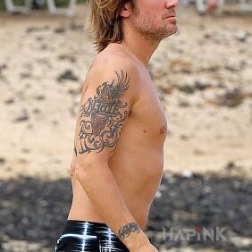 Tattoo Keith Urban - arm tattoo on the upper arm motif: Keith Urban