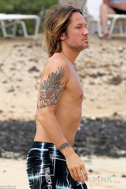 Tattoo Keith Urban - tatuaż na ramieniu in famous people motif on the upper arm