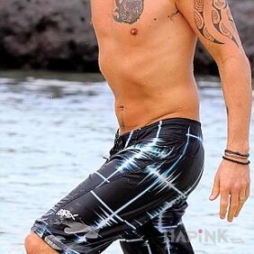 Tattoo Keith Urban in shorts by the sea on the upper arm motif: famous people