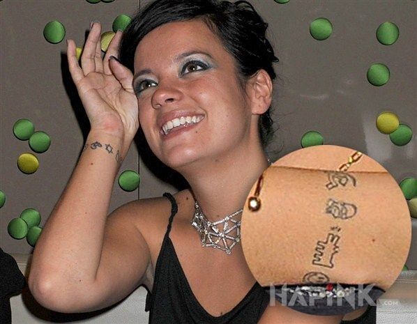 Tattoo Lily Allen - tatuaż znaki in famous people motif on the wrist