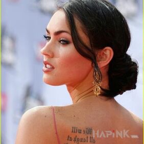 Tattoo Megan Fox - tattoo inscription on her back on the back motif: lettering