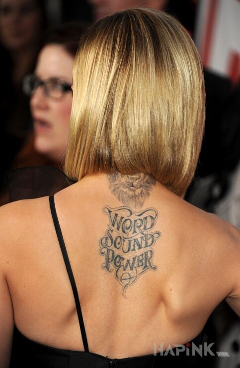 Tattoo Mena Suvari - tatuaż: Word Sound Power in lettering motif on the back