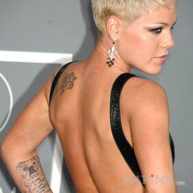Tattoo Pink - star on the back and a squeak on the right forearm + napkin on the upper arm motif: famous people