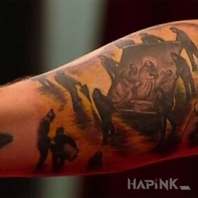 Tattoo Sebastian Bach - religious knit on the arm on the upper arm motif: religious