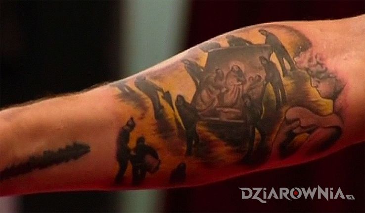 Tatuaż sebastian bach - religijna dziara na ramieniu w motywie religijne na ramieniu