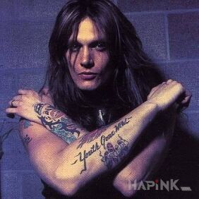 Tattoo Sebastian Bach - a gloomy photo of the knitting on the upper arm motif: famous people