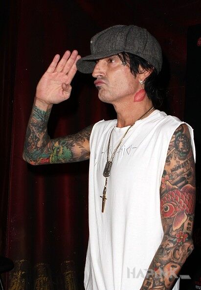Tattoo Tommy Lee - rękawy in famous people motif on the forearm