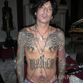 Tattoo Tommy Lee shirtless covered in tattoos on the stomach motif: famous people