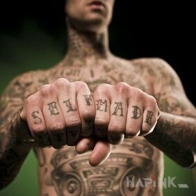 Tattoo Travis Barker - SELF MADE on your toes on the fingers motif: lettering