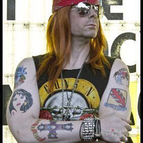 Tattoo W. Axl Rose with tattoos on his arms on the forearm motif: famous people