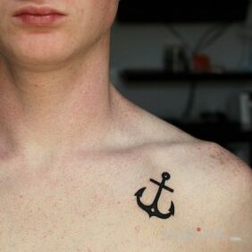 Tattoo Anchor on the chest motif: zodiac signs