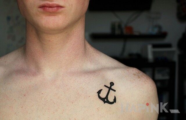 Tattoo Kotwica in zodiac signs motif on the chest