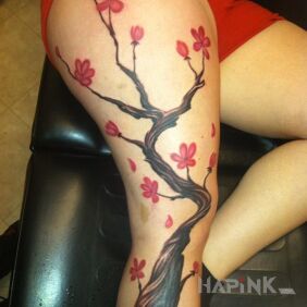 Tattoo Cherry tree on the leg motif: flowers style: japanese / irezumi