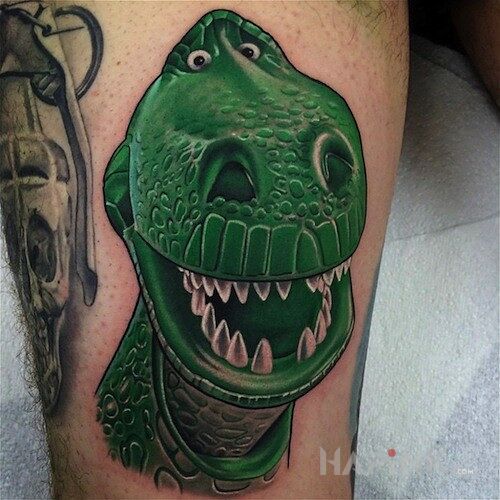 Tattoo REX in characters motif on the calf