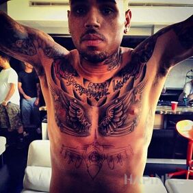 Tattoo Chris Brown on the breast motif: famous people