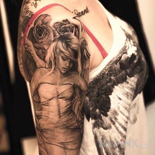 Tattoo Przepiękny aniołek in angels motif on the upper arm