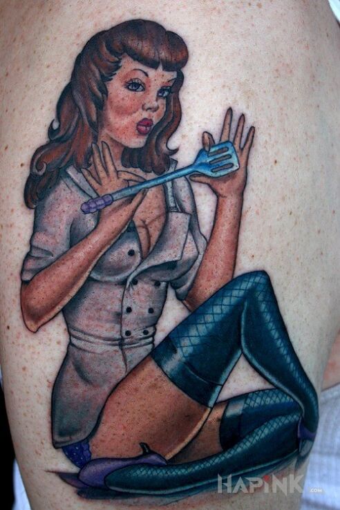 Tattoo Pin up girl 3 in characters motif on the upper arm