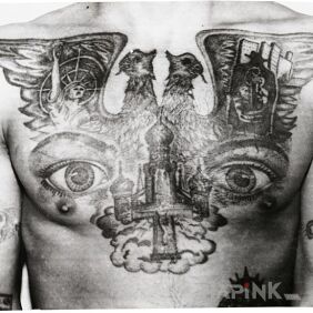Tattoo Tattooed eyes on the chest motif: Prison