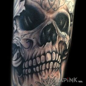 Tattoo Mexican skull on the forearm motif: skulls