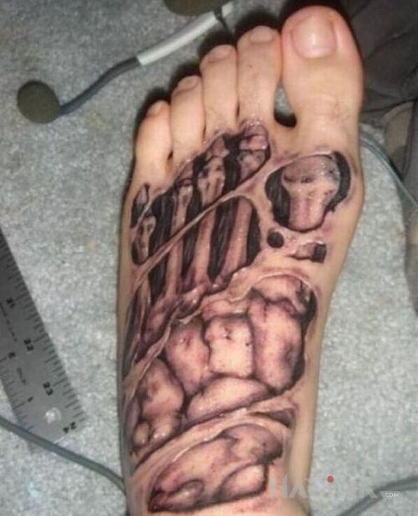 Tattoo Kości stopy in other motif on the foot