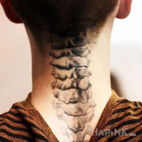 Tattoo Cervical vertebrae on the nape motif: anatomical